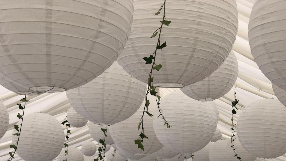 White Paper Lanterns at a Pure White Wedding Hanging Lantern Company